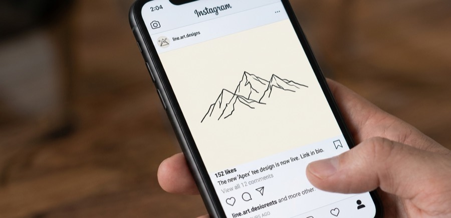 A phone showing the design posted to Instagram with a link in the caption.